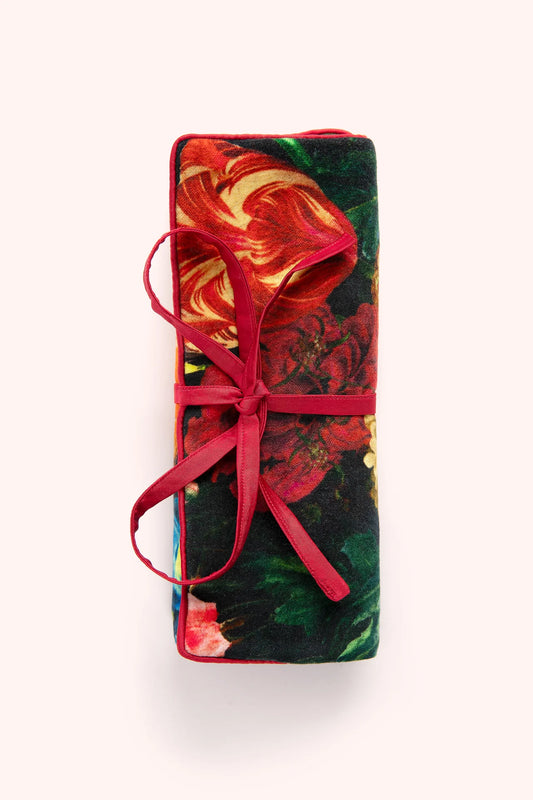 Opulent florals chocolate jewelry roll with velvet interior showing compartments for rings and necklaces