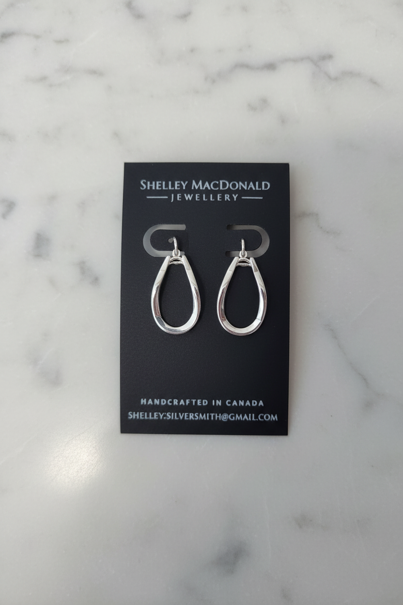 Twisted Dangle Earrings on Marble