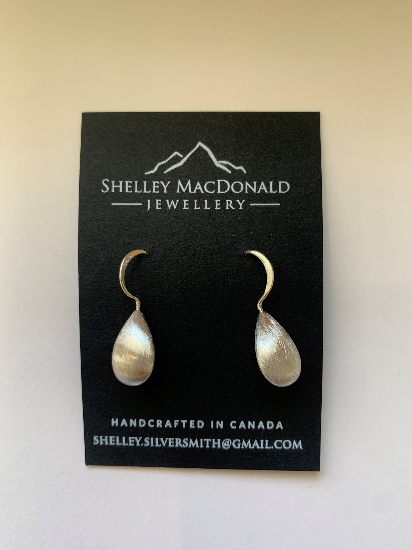 Hollow Teardrop Dangle Earrings with brushed finish